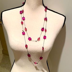 Long strand necklace